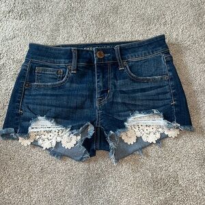 American Eagle denim shorts with lace detail